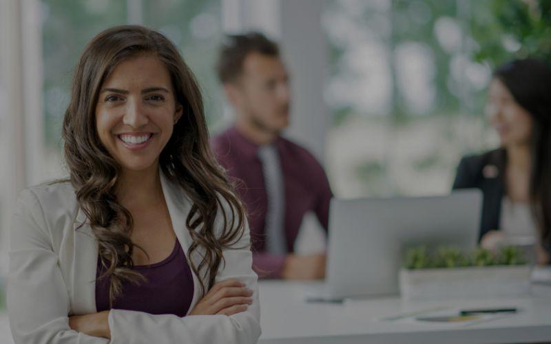 Work professionals wit woman standing at front